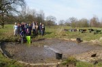 Volunteers and the finished cattle&nbsp;pond