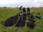 Volunteers working on a&nbsp;berm