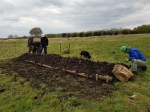 Volunteers working on a&nbsp;berm