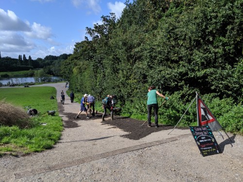 Volunteers working on path